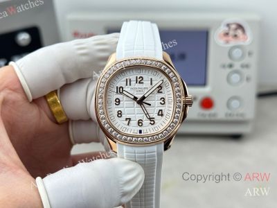 High Quality Replica PATEK PHILIPPE Aquanaut Luce White Integrated Composite Strap White Embossed Pattern Face Dial 48 Diamonds Inlaid Round Octagonal Case Watch 38mm